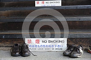 Shoes outside of a Buddhist Temple photo