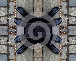 Shoes on the sidewalk in a mirror concept