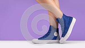 Shoes for sports, blue background. Copy space.