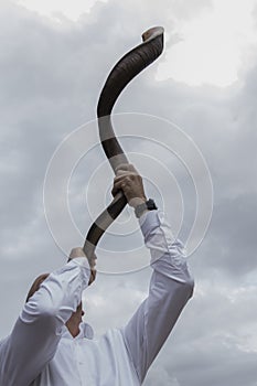 Shofar horn blowing