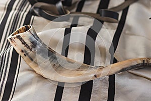 A shofar is placed on a tallit