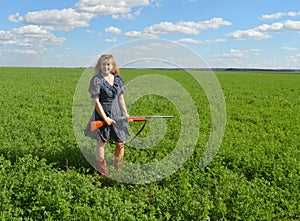 Shoot, gun, area, edge, summer, field, blue dress, red boots, girl, woman, hunting, nature, weapon, rifle, agriculture, young, gam