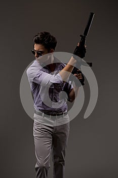 Shooter with automatic rifle