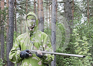 The shooter in camouflage photo