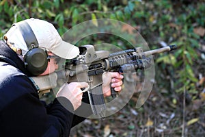 Shooter Pointing AR15