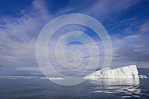 Shooting of ices at a short distance. An iceberg surface with thawing traces.