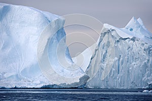 Shooting of ices at a short distance. An iceberg surface with thawing traces.