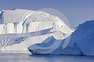 Shooting of ices at a short distance. An iceberg surface with thawing traces.