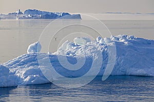 Shooting of ices at a short distance. An iceberg surface with thawing traces.