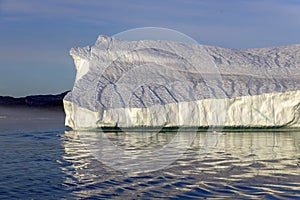 Shooting of ices at a short distance. An iceberg surface with thawing traces.