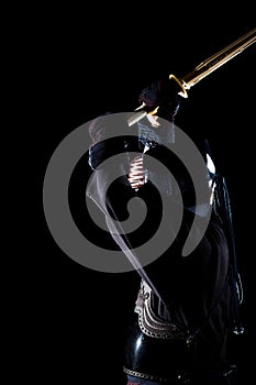 Modern kendo shot on a black background