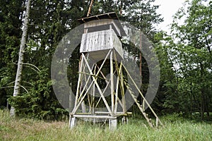 A shooting and observation tower for hunting in the forest