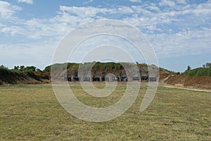 Shooting range with target backboards for rifle and pistol shooting