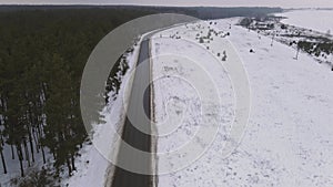 shooting of the road outside the city. aerial photography