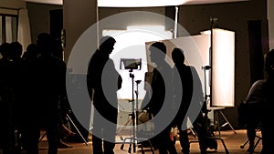 Shooting studio behind the scenes in silhouette images