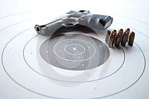 Shooting target with gun and bullet
