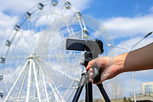 Shooting on the video camera Ferris wheel
