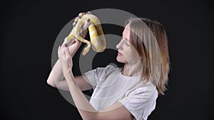 Shooting of woman with albino python in her hands