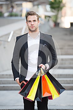 Shop alone. People find shopping partners more akin accomplices in crime. Man carry shopping bag. Guy shopped alone