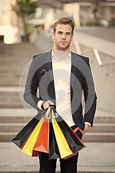 Shop alone. People find shopping partners more akin accomplices in crime. Man carry shopping bag. Guy shopped alone
