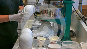 A shop assistant makes hawaiian shave ice