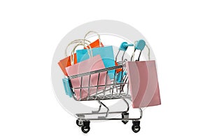 Shop cart with paper bags isolated on white background