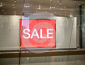 Shop display window and sale sign, sale borad