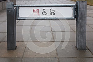 Shop exit for physically challenged persons and strollers