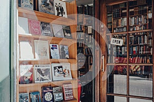 Shop front and open sign on the entrance of Any Amount of Books bookshop in Covent Garden, London, UK