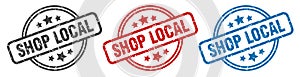 shop local stamp. shop local round isolated sign. photo