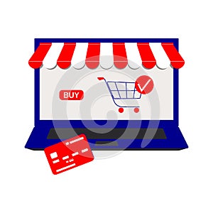 Shop online. E-commerce shopping concept with open laptop screen and credit card for payment.