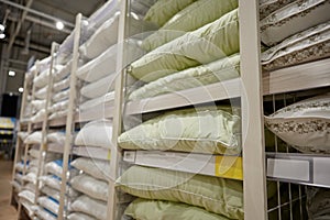 Shop store rack with great assortment of soft orthopedic pillows