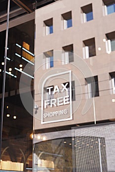 shop tax free text duty free shop sign on shop window