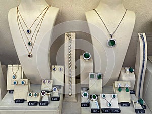 Shop window with a lot of jewellery, showcase jewelry display