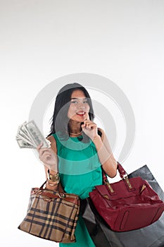 Shopaholic woman spending money and credit card for branded item