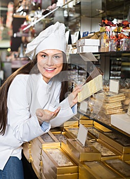 Shopgirl with chocolate and confectionery