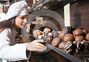 Shopgirl posing with delicious chocolate