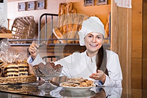 Shopgirl working in bakery