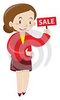 Shopkeeper holding sale sign