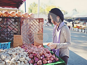 Shopper At Outdoor Market - Shallots, Garlic