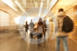 Shopper rushing through corridor, zoom effect, motion blur, cross photo