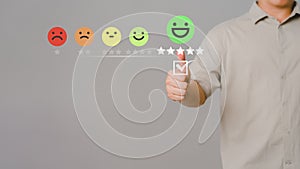 Shopper touching virtual screen on the happy smile face icon and five stars to give satisfaction in service.