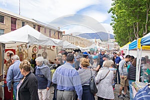 Shoppers browse the stalls at the Salamanca Markets