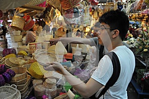 Shoppers at Chatuchak Market in Bangkok