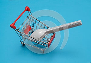 Shoppin cart with plastic spoon