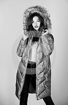 Shopping in any weather. flu and cold. seasonal fashion. woman in padded warm coat. beauty in winter clothing. cold