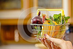 Shopping backet with dieting vegetables