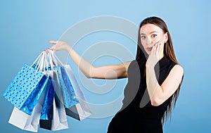 Shopping bag. Big sales. fashion and beauty. sensual woman hold purchase package. sexy woman with long hair at shopping
