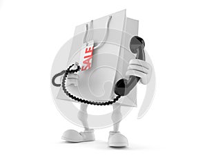 Shopping bag character holding a telephone handset