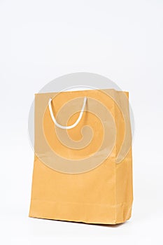 Shopping bag made from recycle paper on white background